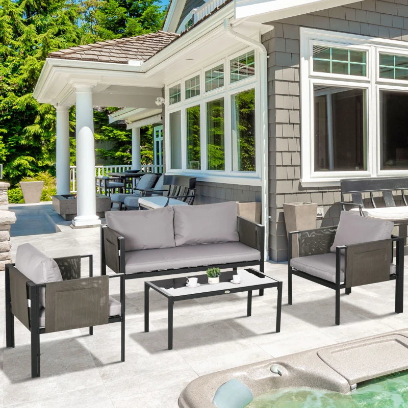 Outsunny 4 Piece Metal Garden Furniture Set with Tempered Glass Coffee Table, Texteline Pocket, Outdoor Patio Set Loveseat Single Armchairs with Padded Cushions, Light Grey