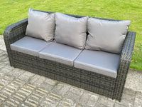 Dark grey wicker rattan garden set with gas fire pit table, 3-seater sofa, and reclining chairs.